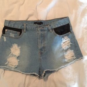 Size 30 jean shorts with leather pockets